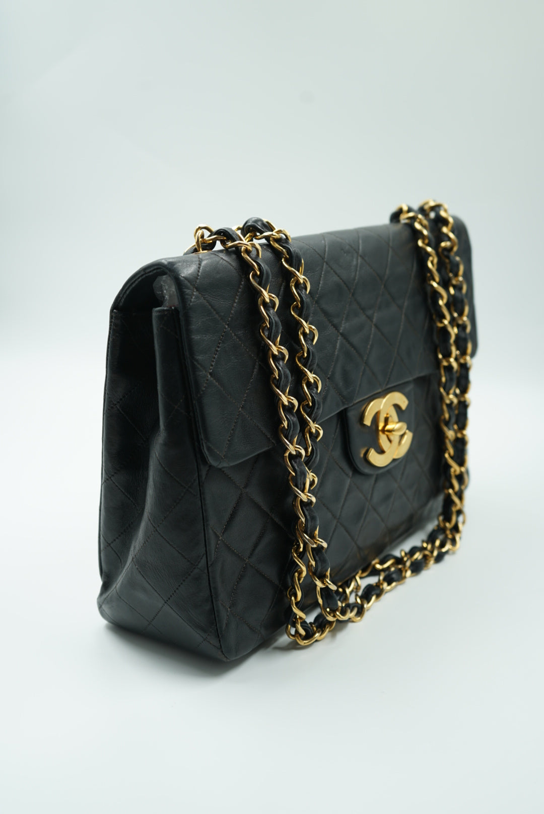 Chanel Black Calfskin Maxi Jumbo XL Luxe Chain Around Flap Bag SHW – Boutique  Patina